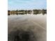 Clear lake with visible bottom and waterfront at 1882 Pine Ridge W Way # E1, Palm Harbor, FL 34684