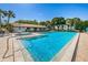 Resort-style pool with spa and clubhouse at 1882 Pine Ridge W Way # E1, Palm Harbor, FL 34684