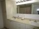 Double vanity bathroom with shower and mirror at 1950 59Th N Ave # 110, St Petersburg, FL 33714