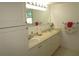 Double vanity bathroom with updated fixtures at 1950 59Th N Ave # 110, St Petersburg, FL 33714