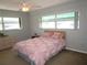 Bright bedroom with a comfortable bed and ample closet space at 1950 59Th N Ave # 110, St Petersburg, FL 33714