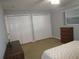 Bedroom with double closets and neutral walls at 1950 59Th N Ave # 110, St Petersburg, FL 33714