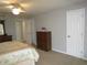 Spacious bedroom with ample closet space and dresser at 1950 59Th N Ave # 110, St Petersburg, FL 33714