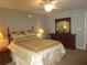 Main bedroom with queen bed and dresser at 1950 59Th N Ave # 110, St Petersburg, FL 33714