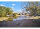 Landscaped pond with a fountain in the community at 1955 Whitney Way, Clearwater, FL 33760