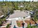 Aerial view of single-Gathering home showcasing its curb appeal and landscaping at 2004 Virginia Dr, Bradenton, FL 34205