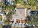 Overhead view of house showing roofline, landscaping and driveway at 2004 Virginia Dr, Bradenton, FL 34205