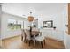 Elegant dining room featuring a wood table and modern light fixture at 2004 Virginia Dr, Bradenton, FL 34205