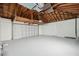 Spacious garage with high ceiling and painted floor at 2004 Virginia Dr, Bradenton, FL 34205