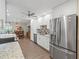 Modern kitchen with stainless steel appliances and granite countertops at 2022 Hawkhurst Cir, Sun City Center, FL 33573