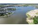 Wide shot of waterfront community with lake and homes at 204 Latitude Pl, Apollo Beach, FL 33572