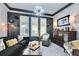 Sophisticated bar area with dark wood cabinets and comfortable seating at 204 Latitude Pl, Apollo Beach, FL 33572