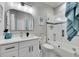 Clean bathroom with white vanity, bathtub, and shower at 204 Latitude Pl, Apollo Beach, FL 33572