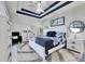 Spacious main bedroom with a white bed, nightstands, and dresser at 204 Latitude Pl, Apollo Beach, FL 33572