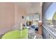 Bright and airy screened porch with glass-top table and chairs at 204 Latitude Pl, Apollo Beach, FL 33572