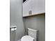 Simple and clean toilet in a small bathroom at 204 Latitude Pl, Apollo Beach, FL 33572