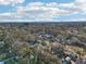 Aerial view of a residential neighborhood showcasing numerous houses and lush greenery at 2300 Lancaster Dr, Clearwater, FL 33764