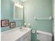 Clean bathroom with white vanity and fixtures at 2300 Lancaster Dr, Clearwater, FL 33764