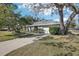 Charming single story home with metal roof and attached garage at 2300 Lancaster Dr, Clearwater, FL 33764