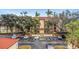 Condo building aerial view showing parking and landscaping at 2400 Feather Sound Dr # 913, Clearwater, FL 33762