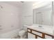 Clean bathroom with a tub and vanity at 2400 Feather Sound Dr # 913, Clearwater, FL 33762