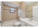 Clean bathroom with tile shower/tub and vanity at 2715 Narcissus Dr, Holiday, FL 34691