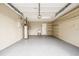 Bright garage with built-in shelving at 2715 Narcissus Dr, Holiday, FL 34691