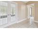 View of interior with doors leading to a patio at 2715 Narcissus Dr, Holiday, FL 34691