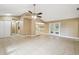 Open living area with tile floors and access to kitchen at 2715 Narcissus Dr, Holiday, FL 34691