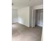 Spacious bedroom with tile floor and closet at 2801 Auburn W Ave, Tampa, FL 33614