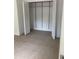 Large closet with bi-fold doors and shelving at 2801 Auburn W Ave, Tampa, FL 33614