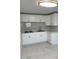 Modern white kitchen with gas stove and corner sink at 2801 Auburn W Ave, Tampa, FL 33614