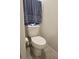 Clean and simple bathroom with toilet and tiled floor at 2878 Grand Kemerton Pl, Tampa, FL 33618