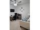 Bright home office with workspace and comfy seating area at 2878 Grand Kemerton Pl, Tampa, FL 33618