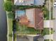 Top-down view of house with solar panels and pool at 3190 Shoreline Dr, Clearwater, FL 33760