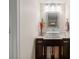 Modern bathroom with a dark brown vanity and a white vessel sink at 3190 Shoreline Dr, Clearwater, FL 33760