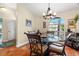 Cozy dining area with a round glass-top table and four chairs at 3190 Shoreline Dr, Clearwater, FL 33760