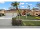 Two-story house with a two-car garage and palm trees at 3190 Shoreline Dr, Clearwater, FL 33760