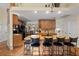 Kitchen island with seating for four and granite countertops at 3190 Shoreline Dr, Clearwater, FL 33760