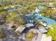 Aerial view showing condo building and parking at 3578 Indigo Pond Dr, Palm Harbor, FL 34685