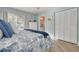 Primary bedroom with a king-size bed and large closet at 3578 Indigo Pond Dr, Palm Harbor, FL 34685