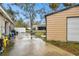 Backyard patio, wet concrete, and detached garage at 3915 W Pearl Ave, Tampa, FL 33611