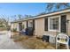 Backyard with patio, grill and storage at 3915 W Pearl Ave, Tampa, FL 33611