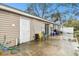 Backyard with patio, storage shed, and grill at 3915 W Pearl Ave, Tampa, FL 33611