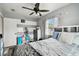 Bright bedroom with a double bed and ceiling fan at 3915 W Pearl Ave, Tampa, FL 33611