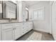 Double vanity bathroom with ample counter space and storage at 3925 1St Ne St, St Petersburg, FL 33703