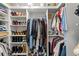 Well-organized closet with hanging rods and shoe storage at 3925 1St Ne St, St Petersburg, FL 33703