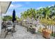 Outdoor patio with grill, table, and chairs at 3925 1St Ne St, St Petersburg, FL 33703