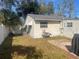 Fenced backyard with storage shed and patio area at 4034 39Th N Ave, St Petersburg, FL 33714