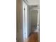 Simple hallway with light walls and wood floors at 4034 39Th N Ave, St Petersburg, FL 33714